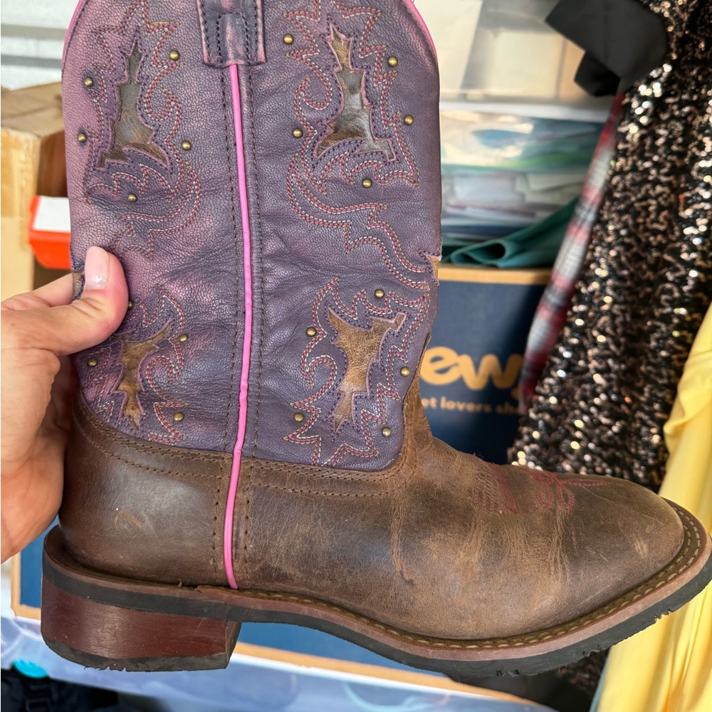 I bought my daughter these purple Laredo boots. She only wore them a few times.